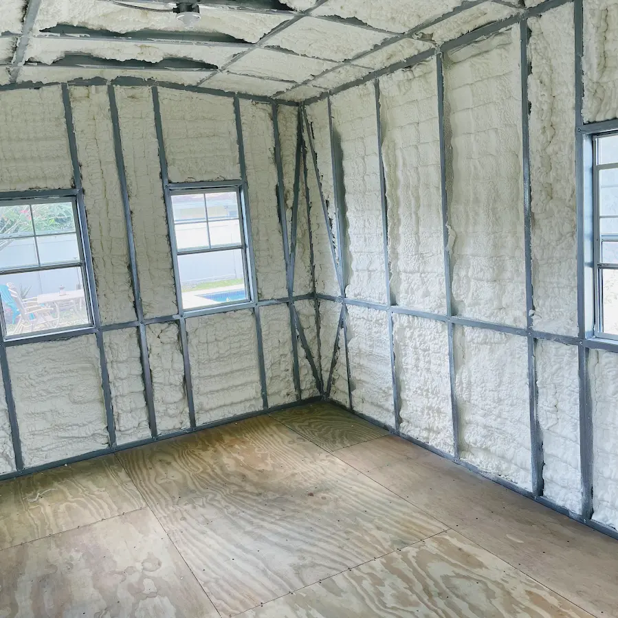 Closed-cell spray foam insulation applied to wall cavities in a residential project in Prattville